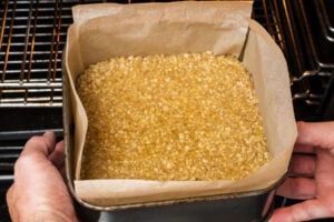 Putting the flapjack mixture into the oven